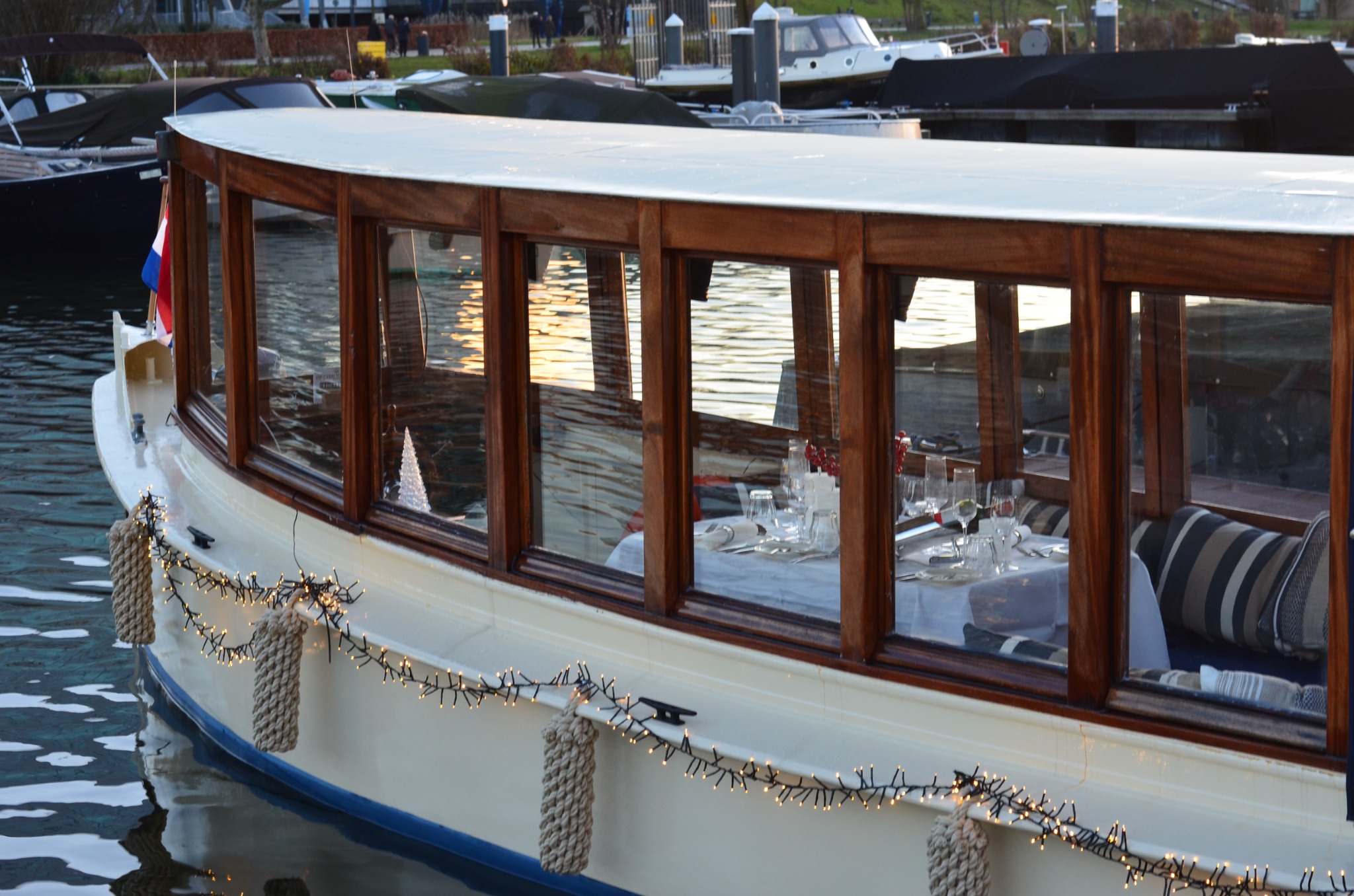 Night Boat Tour Amsterdam aboard historic salon boat Energie in Amsterdam